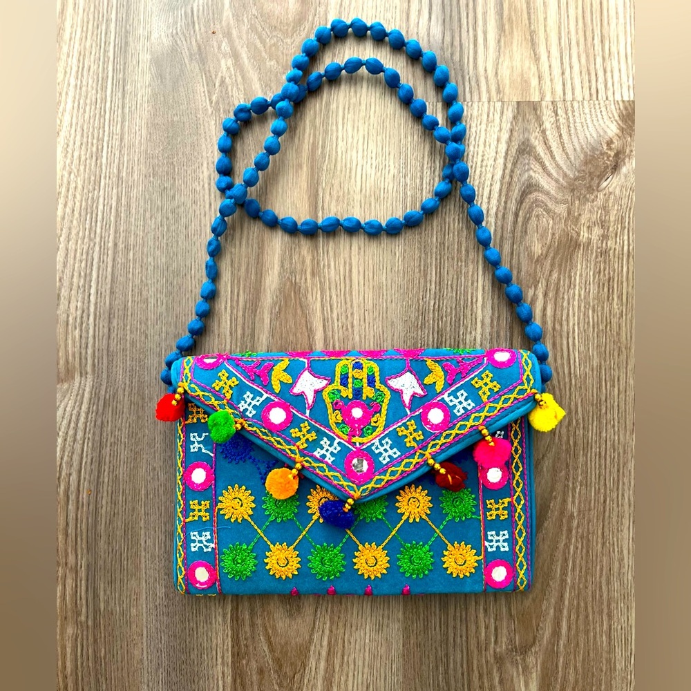 New With No Tag Blue/Green Background Colorful  Embodied Purse /Clutch